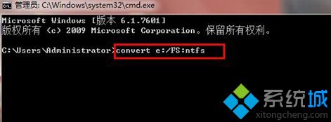 輸入命令”convert e:/FS:ntfs”,e